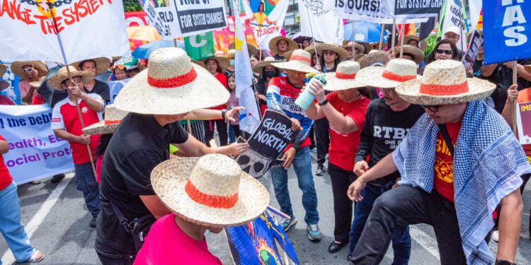 IN FRAMES: Filipino Protesters Join Global Mobilization Urging Wealth Taxes, Debt Relief