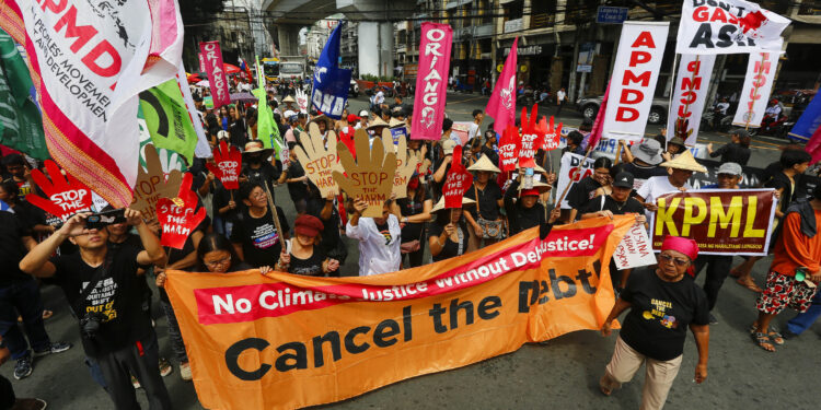 IN FRAMES: Filipino Activists Demand Wealth Tax